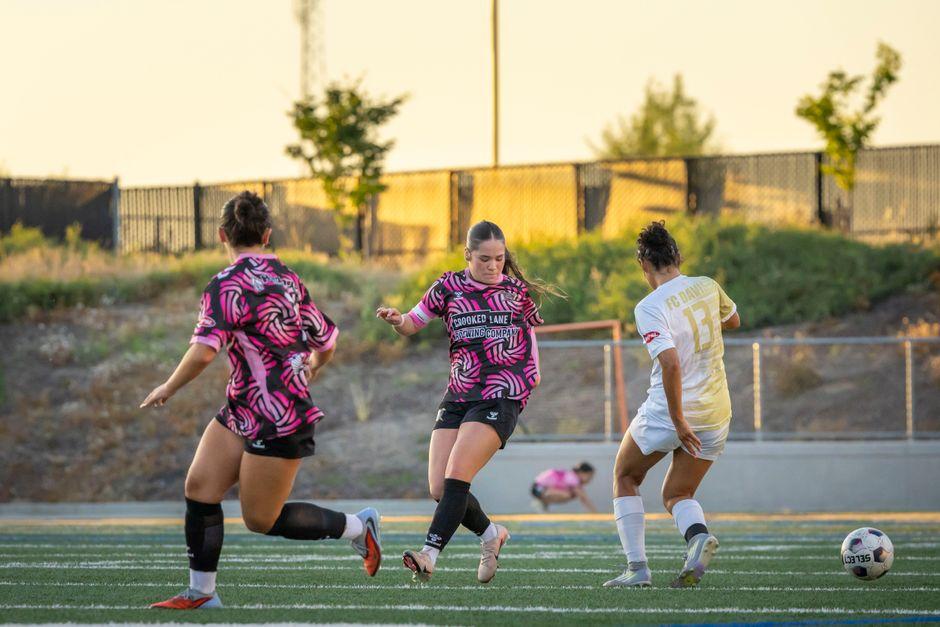Women S Soccer Game Action on a Sunny Day